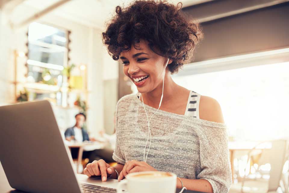 woman having meeting on laptop