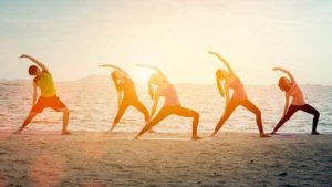 People streching on the beach