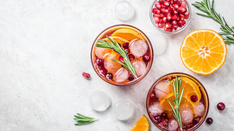 Alcohol-Free Festive cranberry citrus pomegranate cocktail.